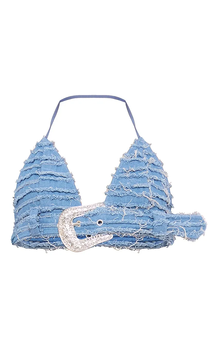 Top dos nu en jean bleu très déchiré à boucle strassée